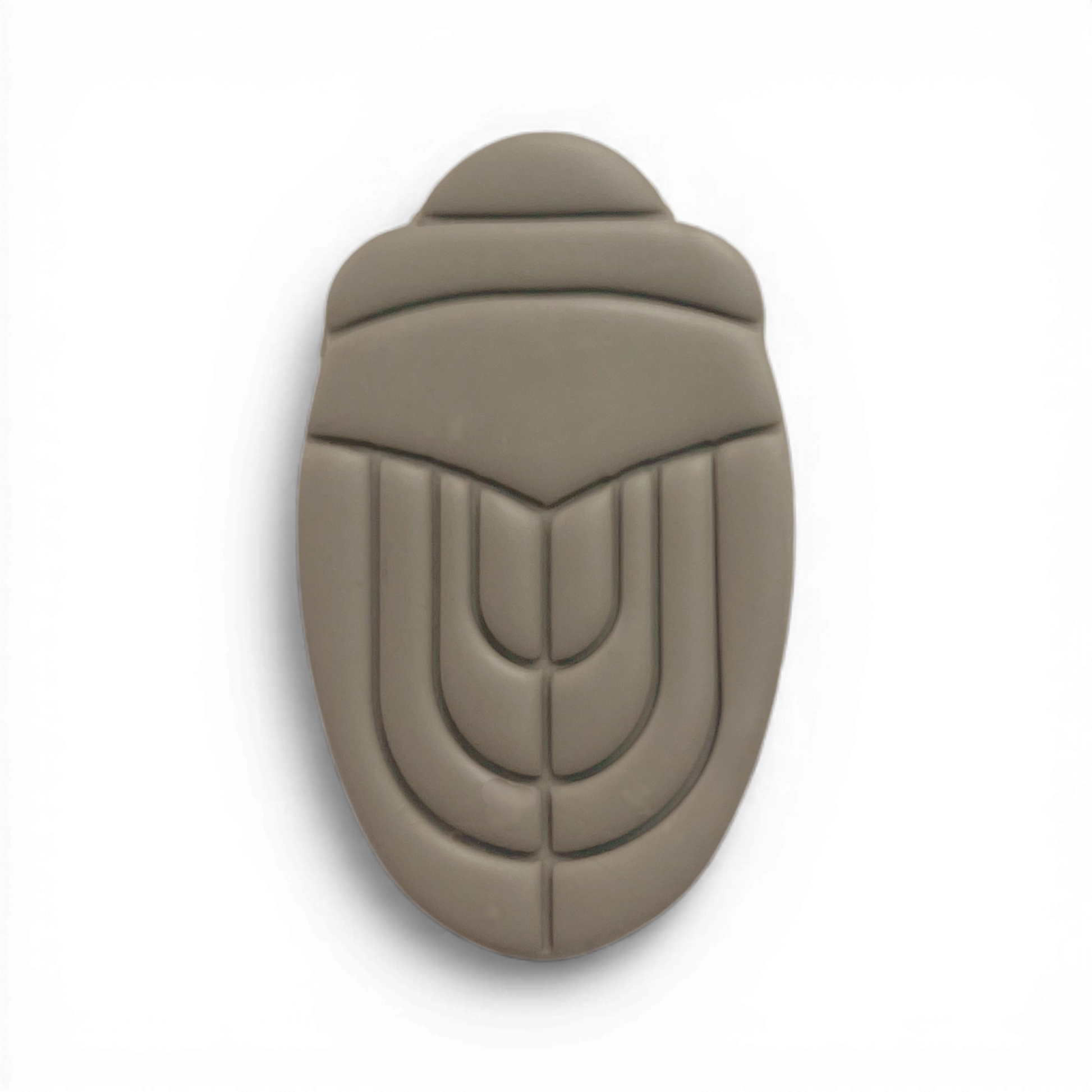 Art Deco Scarab polymer clay shape in warm taupe with vintage insect silhouette on white background.