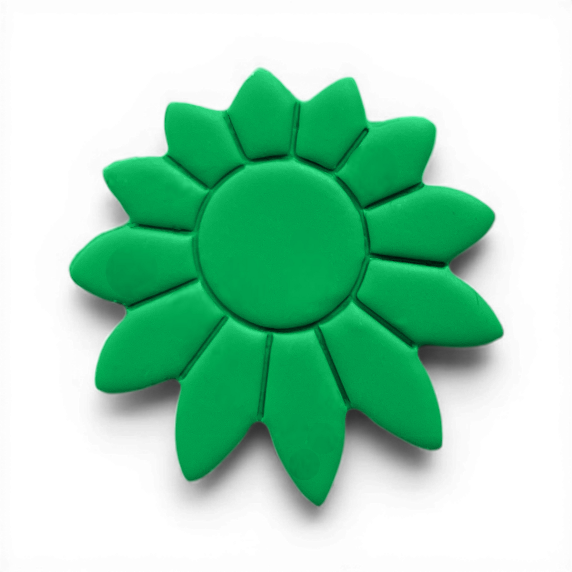 Boho Daisy polymer clay floral shape in fresh green with structured sunburst petals on white background.