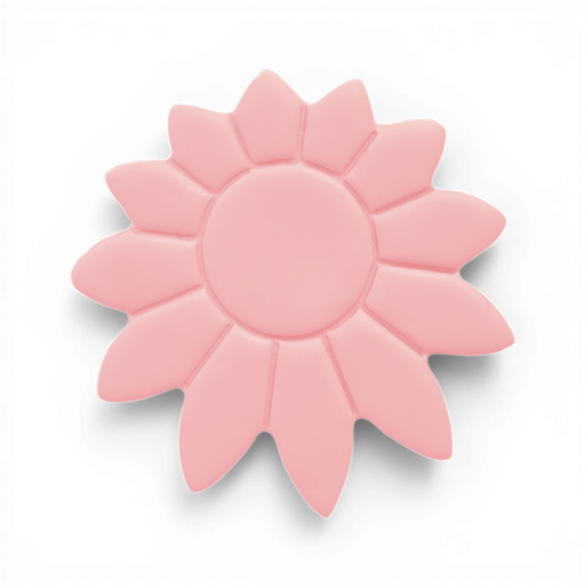 Boho Daisy polymer clay floral shape in soft pink with retro petal detailing on white background.