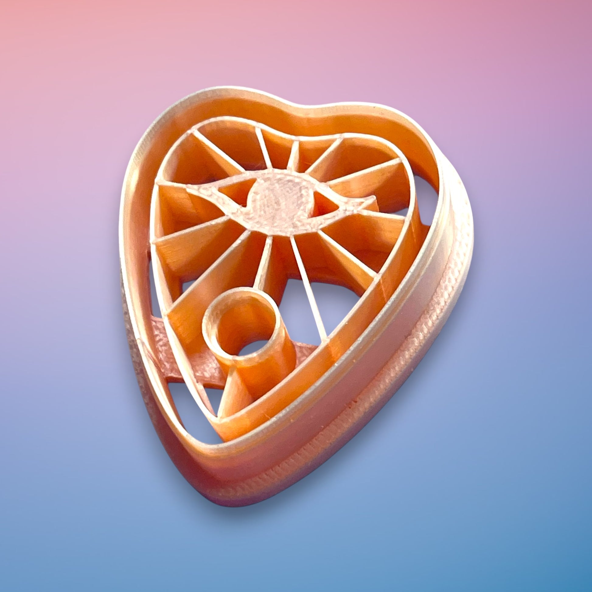 Eye Planchette Polymer Clay Cutter
Eye Planchette polymer clay cutter with mystical eye motif and radiant line detailing on white background.