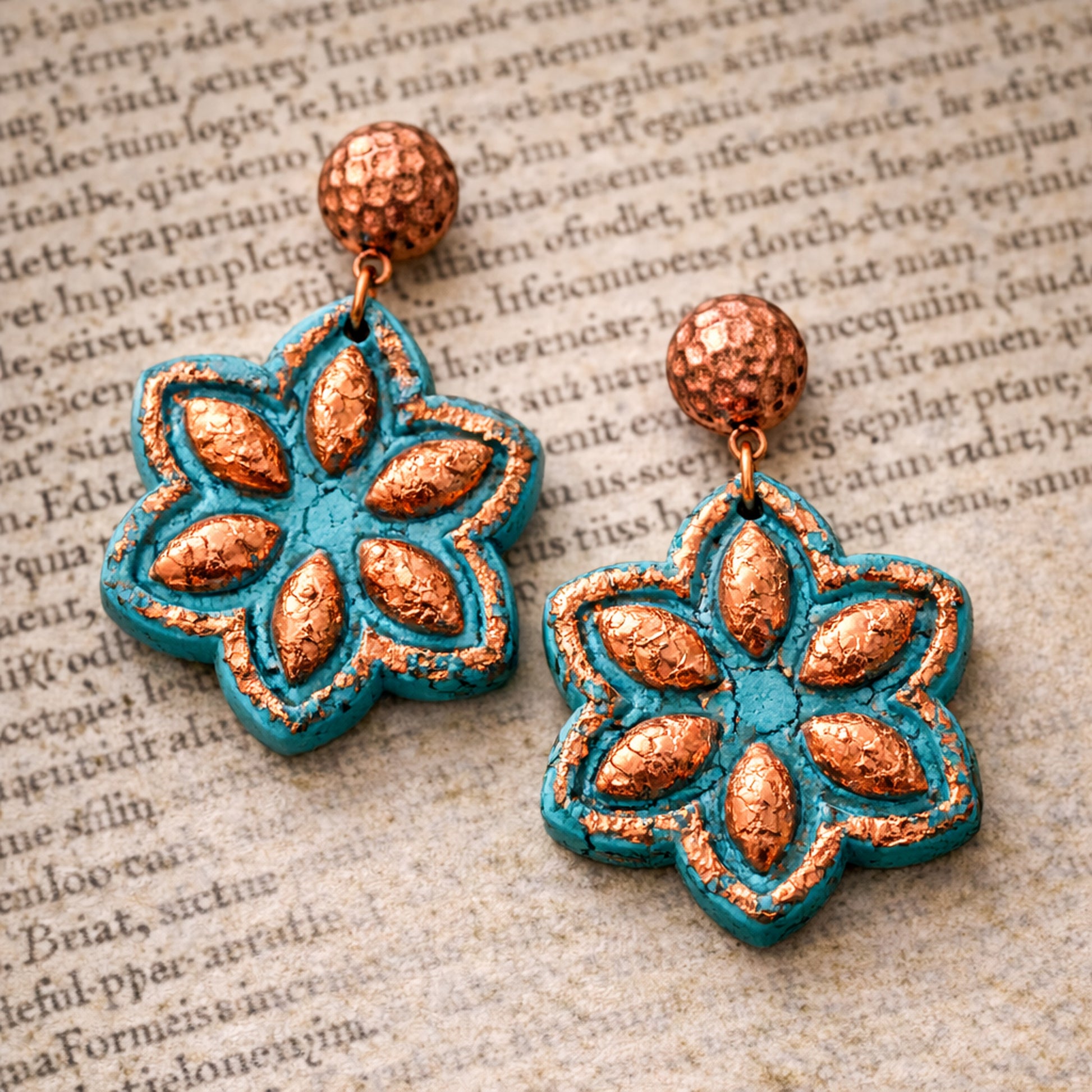 Floral medallion polymer clay earrings in faux turquoise with copper foil accents