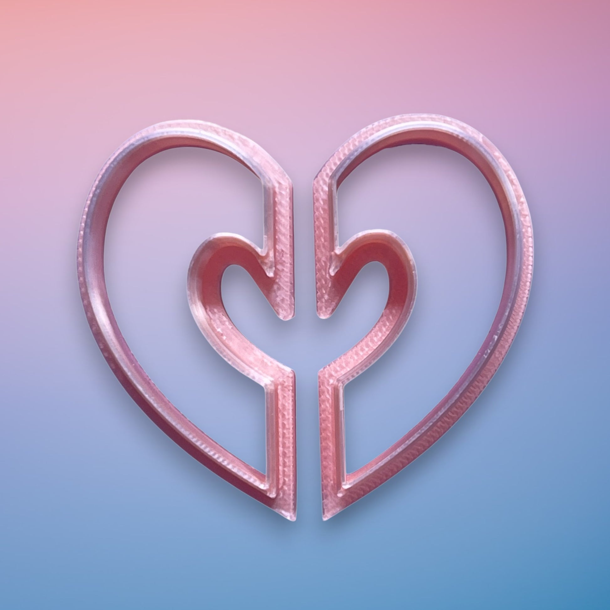 Half Hearts Donut Polymer Clay Cutter
Half Hearts Donut polymer clay cutter with mirrored open-heart circular frame on white background.