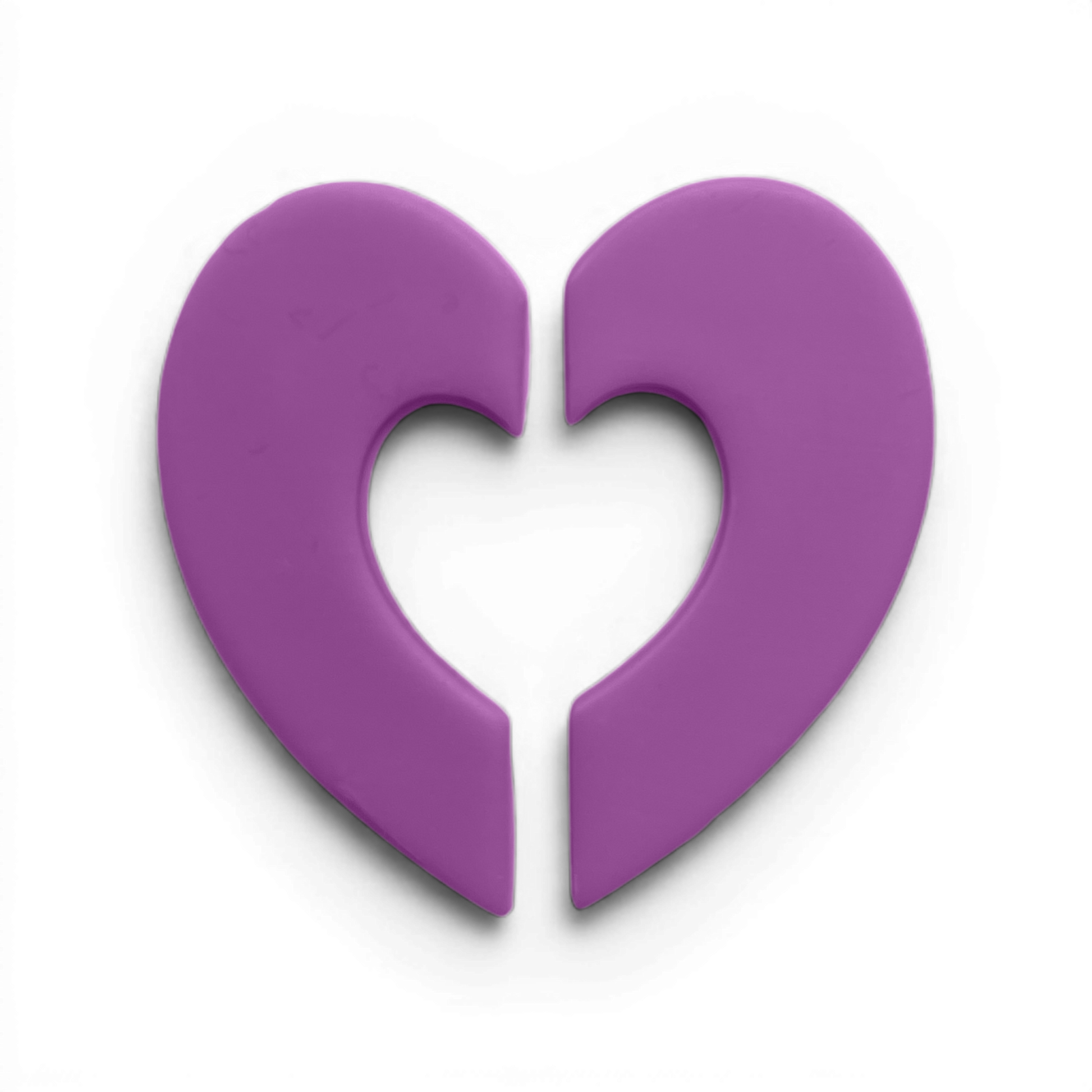 Half Hearts Donut Polymer Clay Lavender
Half Hearts Donut polymer clay shape in soft lavender with circular mirrored heart detailing on white background.