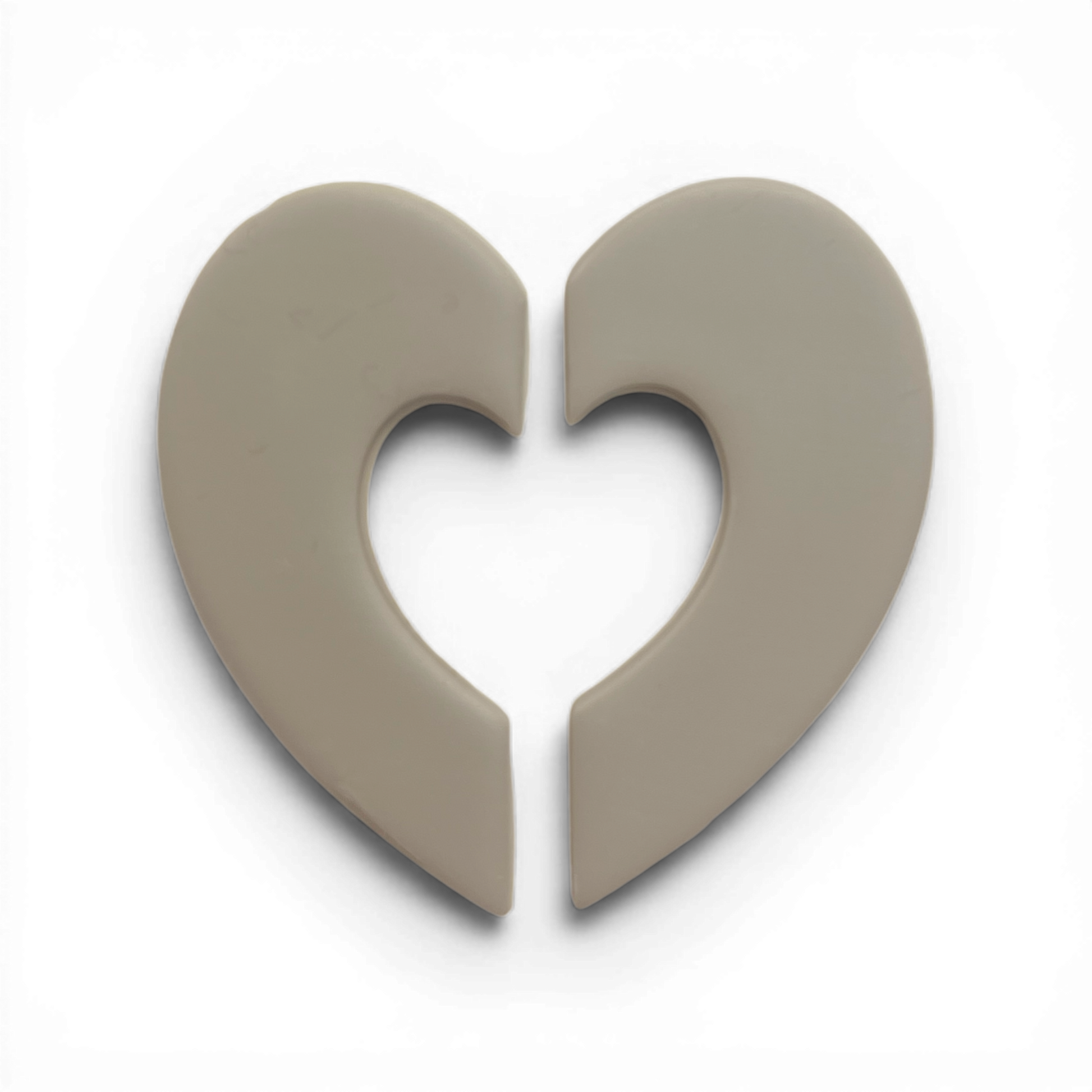 Half Hearts Donut Polymer Clay Taupe
Half Hearts Donut polymer clay shape in warm taupe with open-heart circular silhouette on white background.