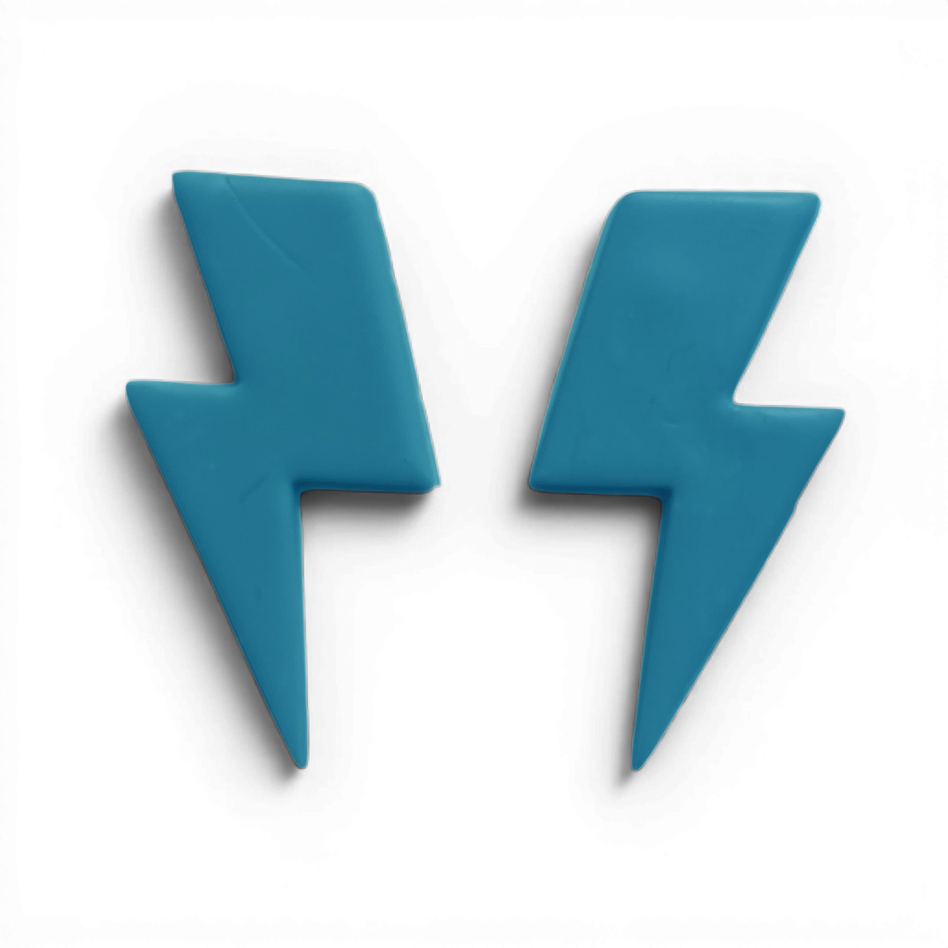 Lightening Bolt Polymer Clay Blue
Lightening Bolt polymer clay shape in soft blue with modern lightning bolt outline on white background.