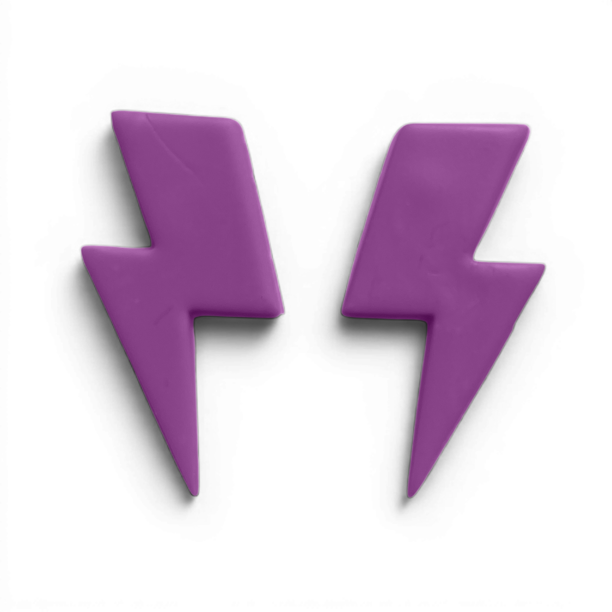 Lightening Bolt Polymer Clay Lavender
Lightening Bolt polymer clay shape in soft lavender with angular lightning design on white background.