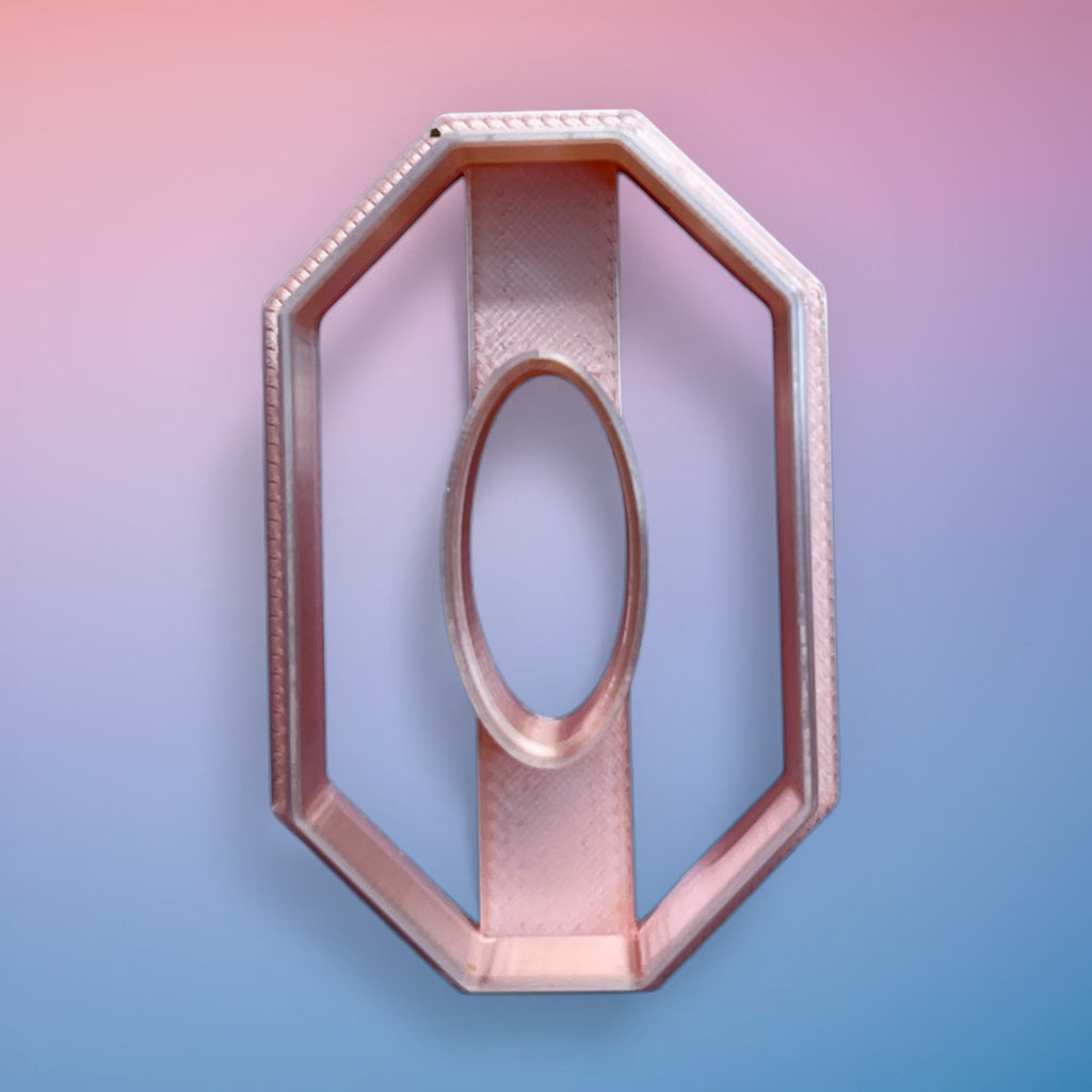 Long Octagon Oval Donut polymer clay cutter with elongated geometric open-frame shape on white background.