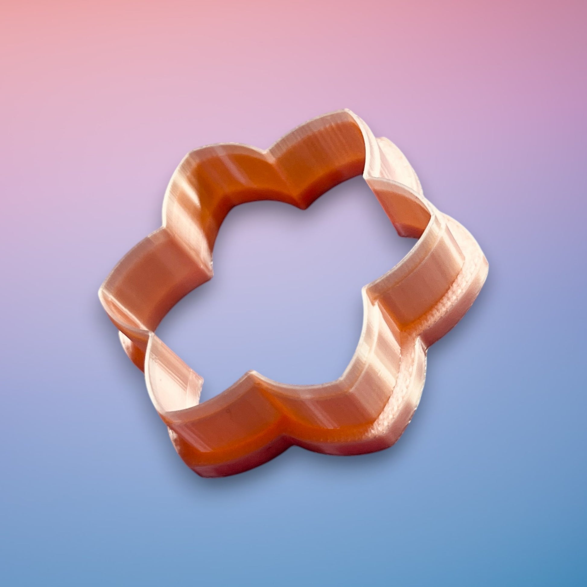 Petal Bloom Polymer Clay Cutter
Petal Bloom polymer clay cutter with layered floral silhouette on white background.