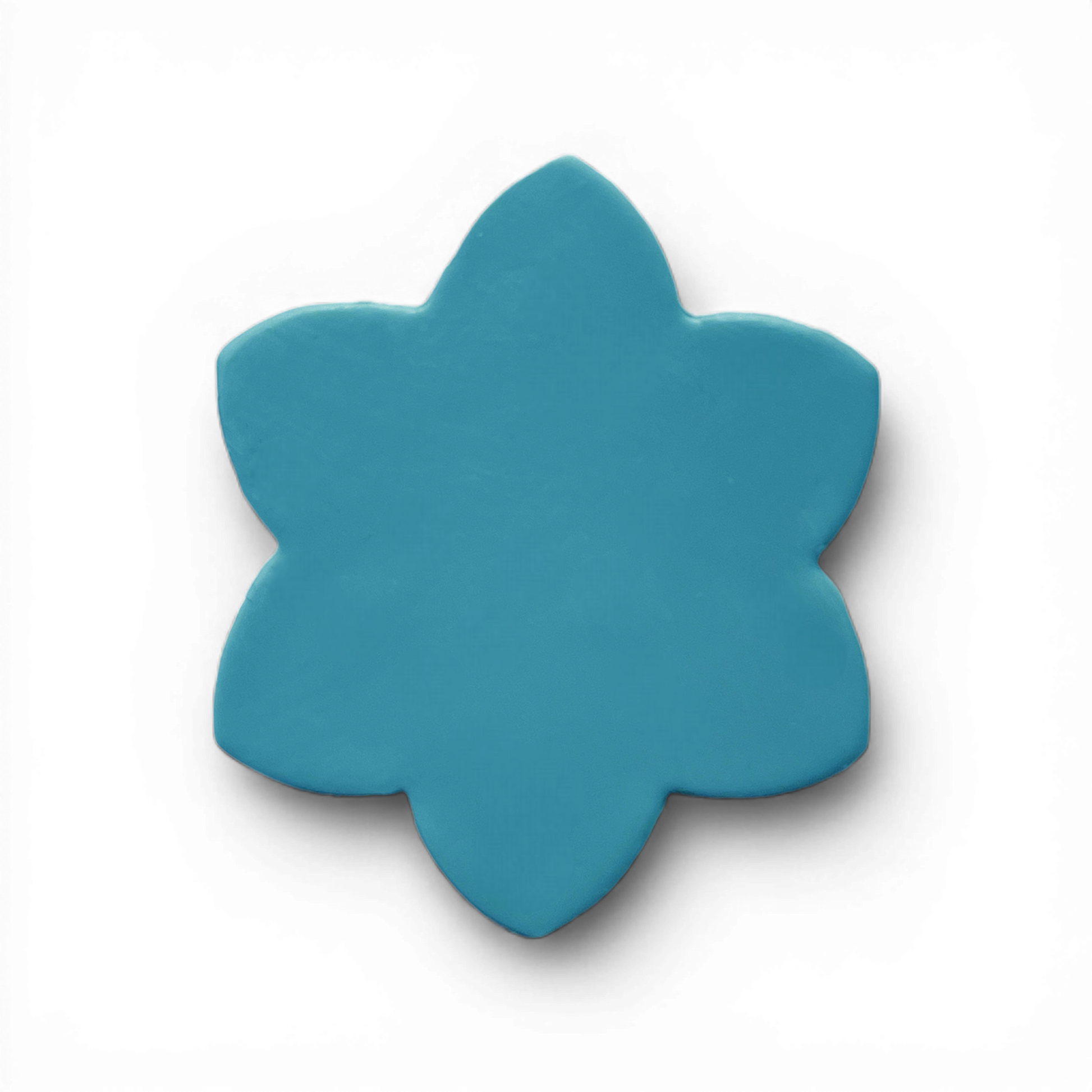 Petal Bloom, Polymer Clay Blue
Petal Bloom polymer clay shape in soft blue with structured bloom silhouette on white background.