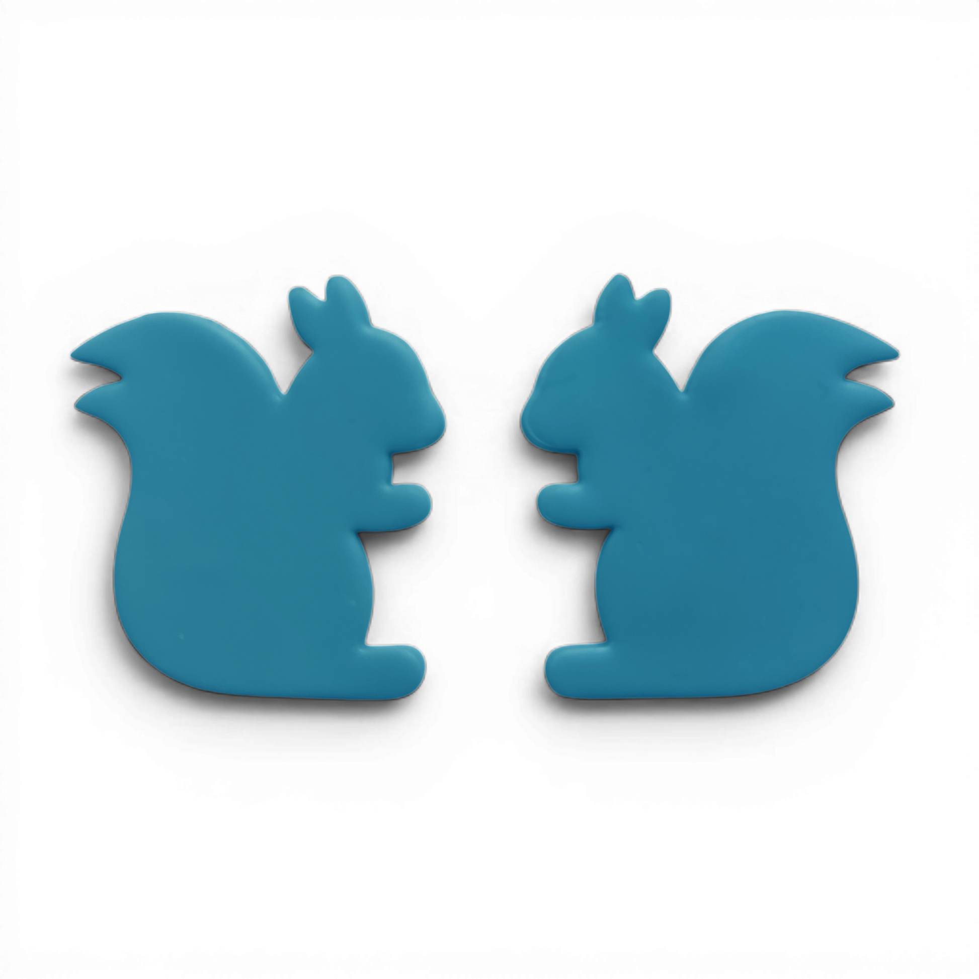 Squirrel, Polymer Clay Blue
Squirrel polymer clay shapes in soft blue with woodland detailing on white background.