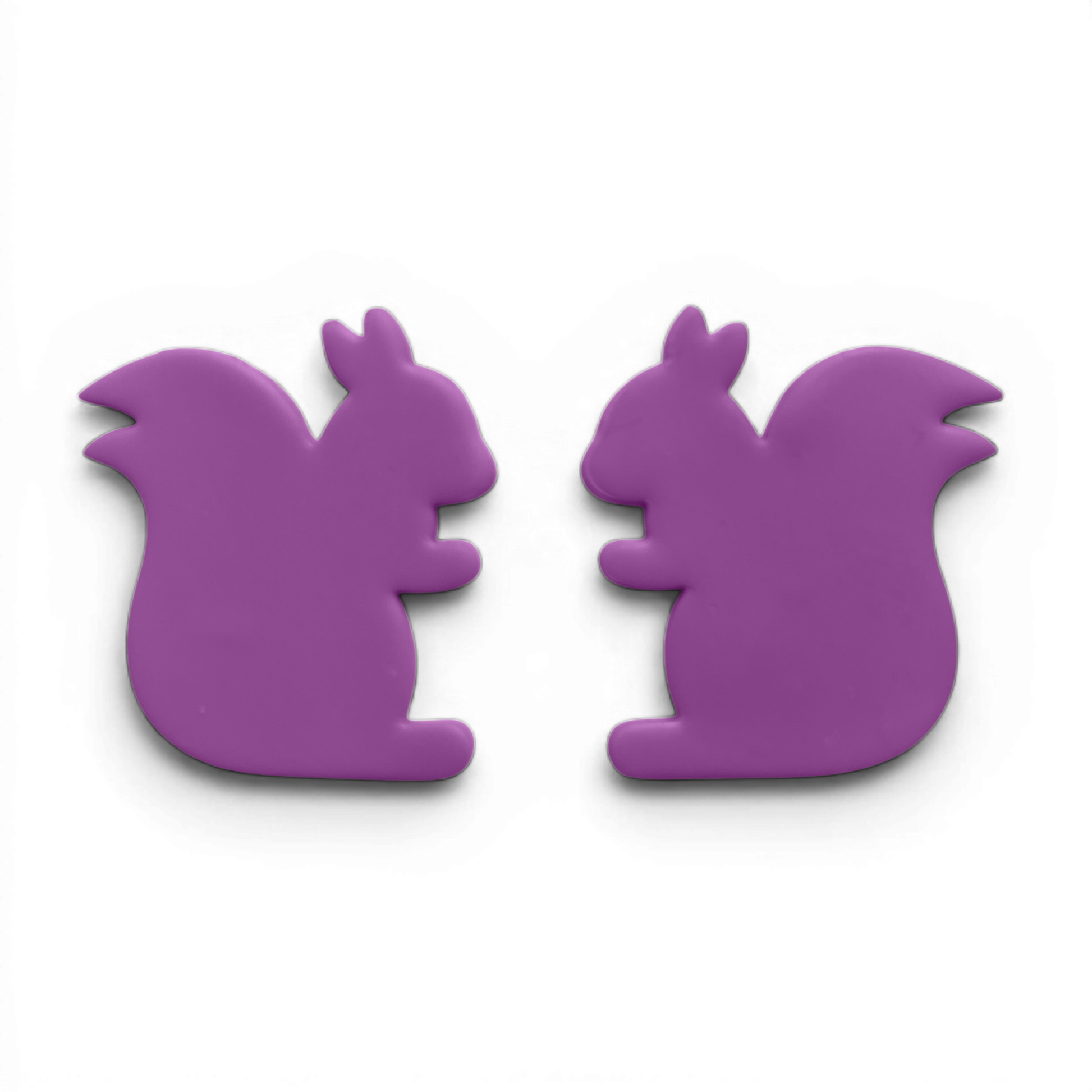 Squirrel, Polymer Clay Lavender
Squirrel polymer clay shape in lavender with curved tail silhouette on white background.