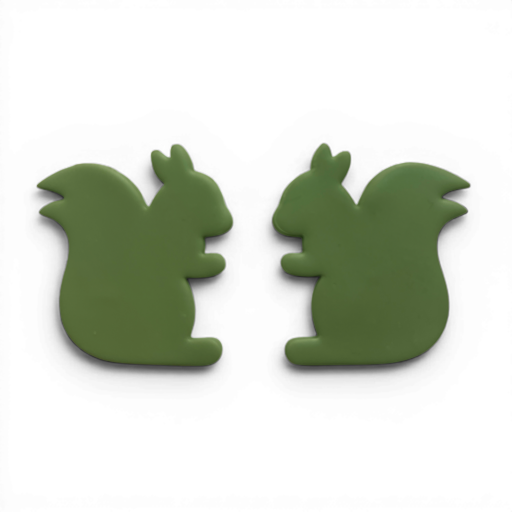 Squirrel, Polymer Clay Olive
Squirrel polymer clay shape in olive with woodland profile design on white background.