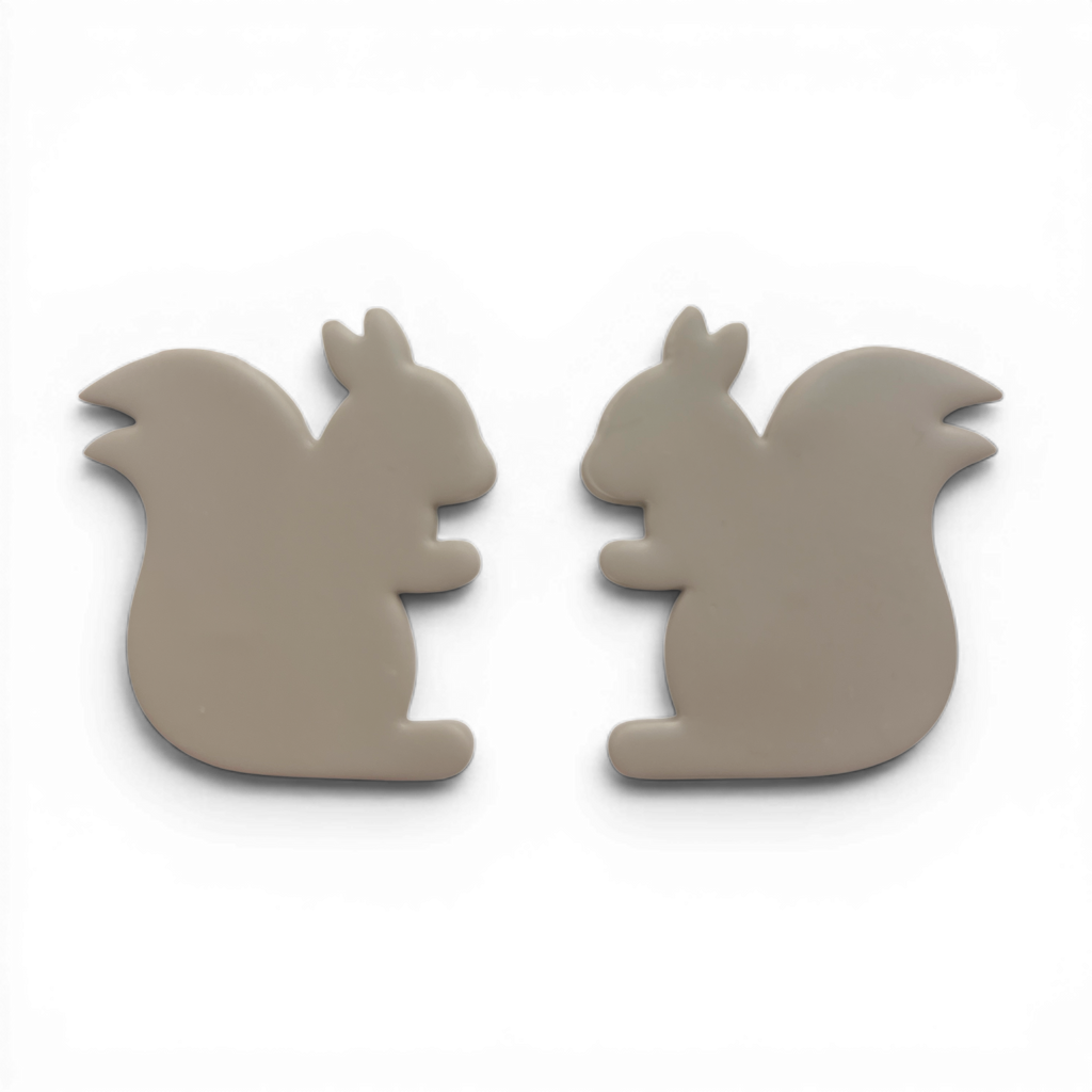 Squirrel, Polymer Clay Taupe
Squirrel polymer clay shape in taupe with smooth tail silhouette on white background.