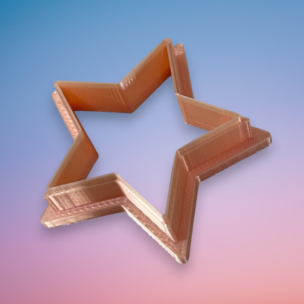 Five point star polymer clay cutter with clean geometric angles for earrings and pendants.