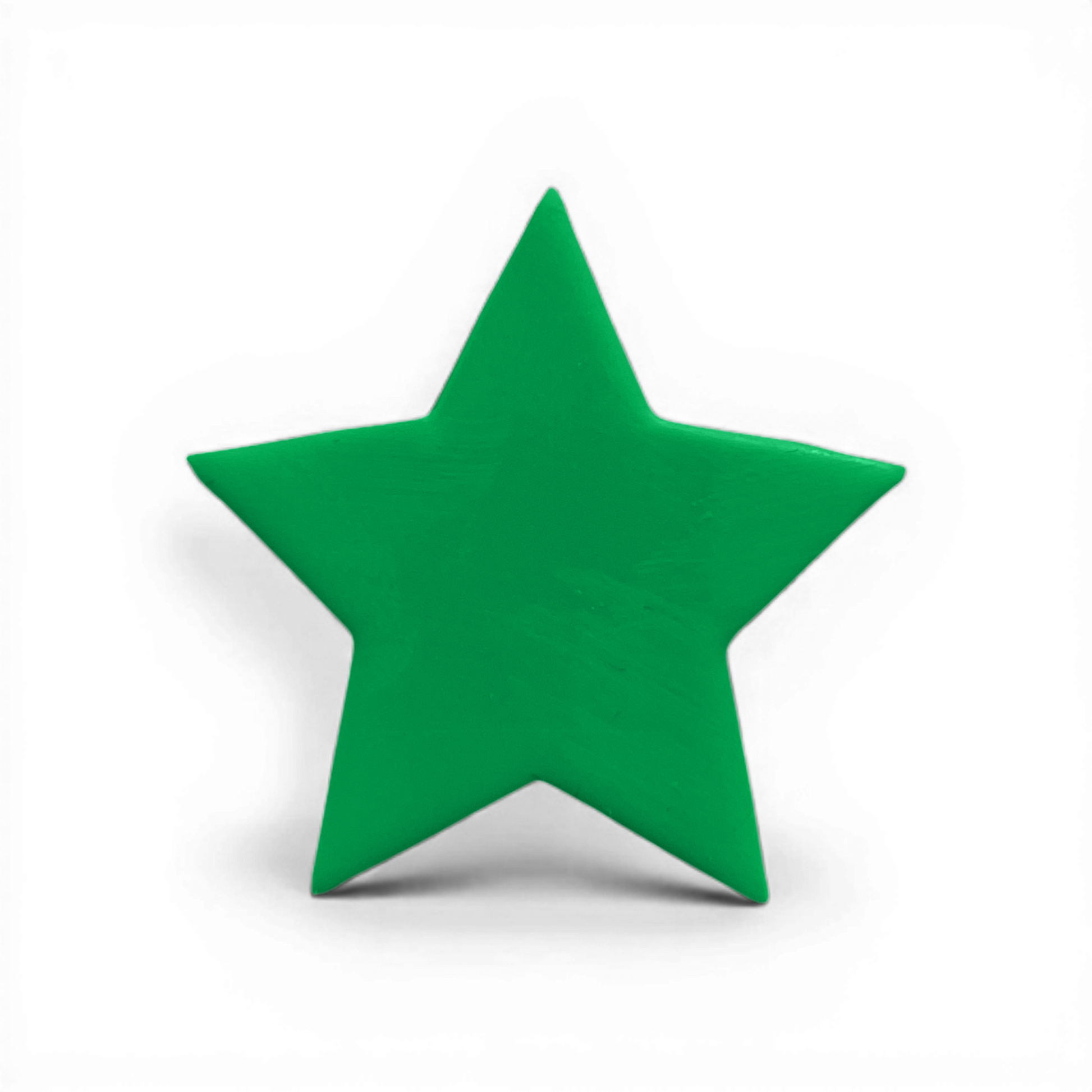 Green polymer clay five point star shape with crisp angles.