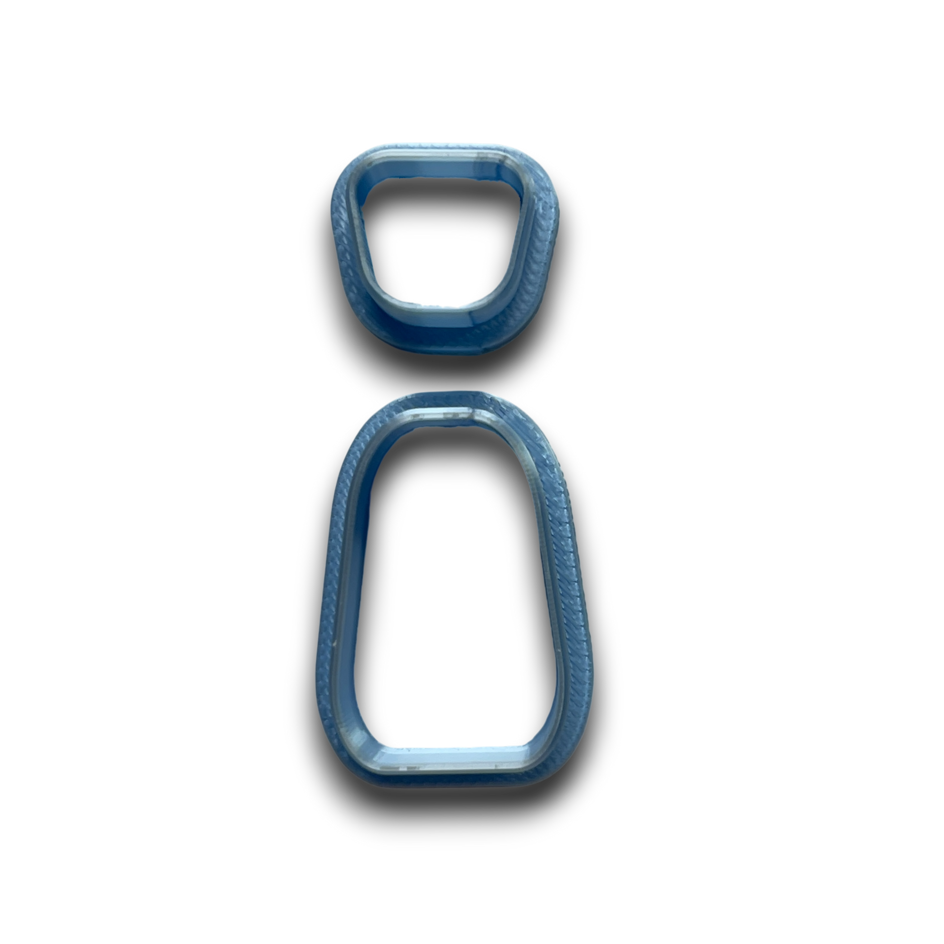 Trapezoid drop polymer clay cutter with clean tapered geometric silhouette.