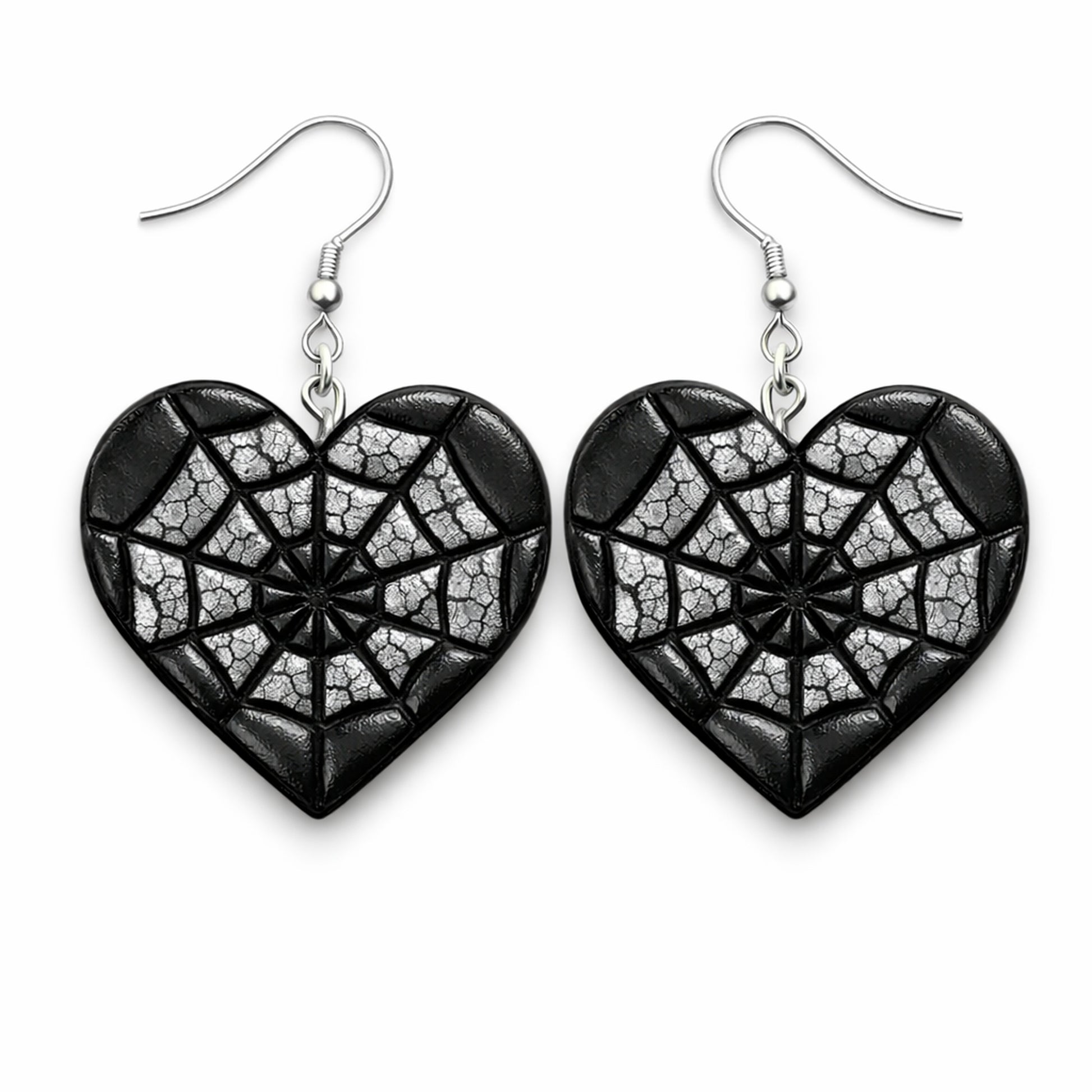 Webbed Heart polymer clay earrings in black with silver highlighted cobweb embossing