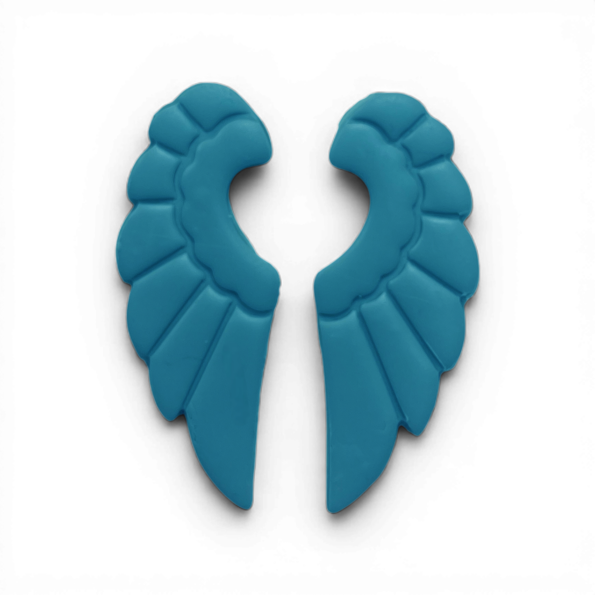 Wings Polymer Clay Blue
Wings polymer clay shape in soft blue with bold layered wing detailing on white background.