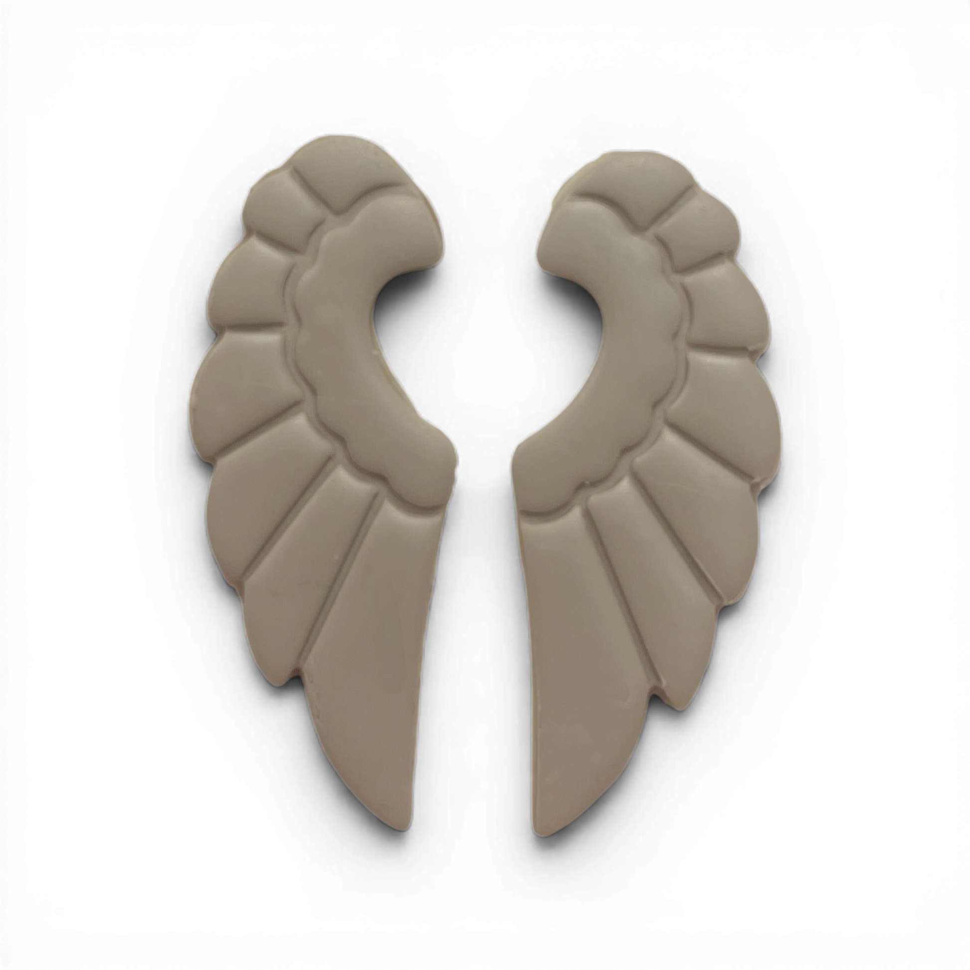 Wings Polymer Clay Taupe
Wings polymer clay shape in warm taupe with symmetrical wing styling on white background.