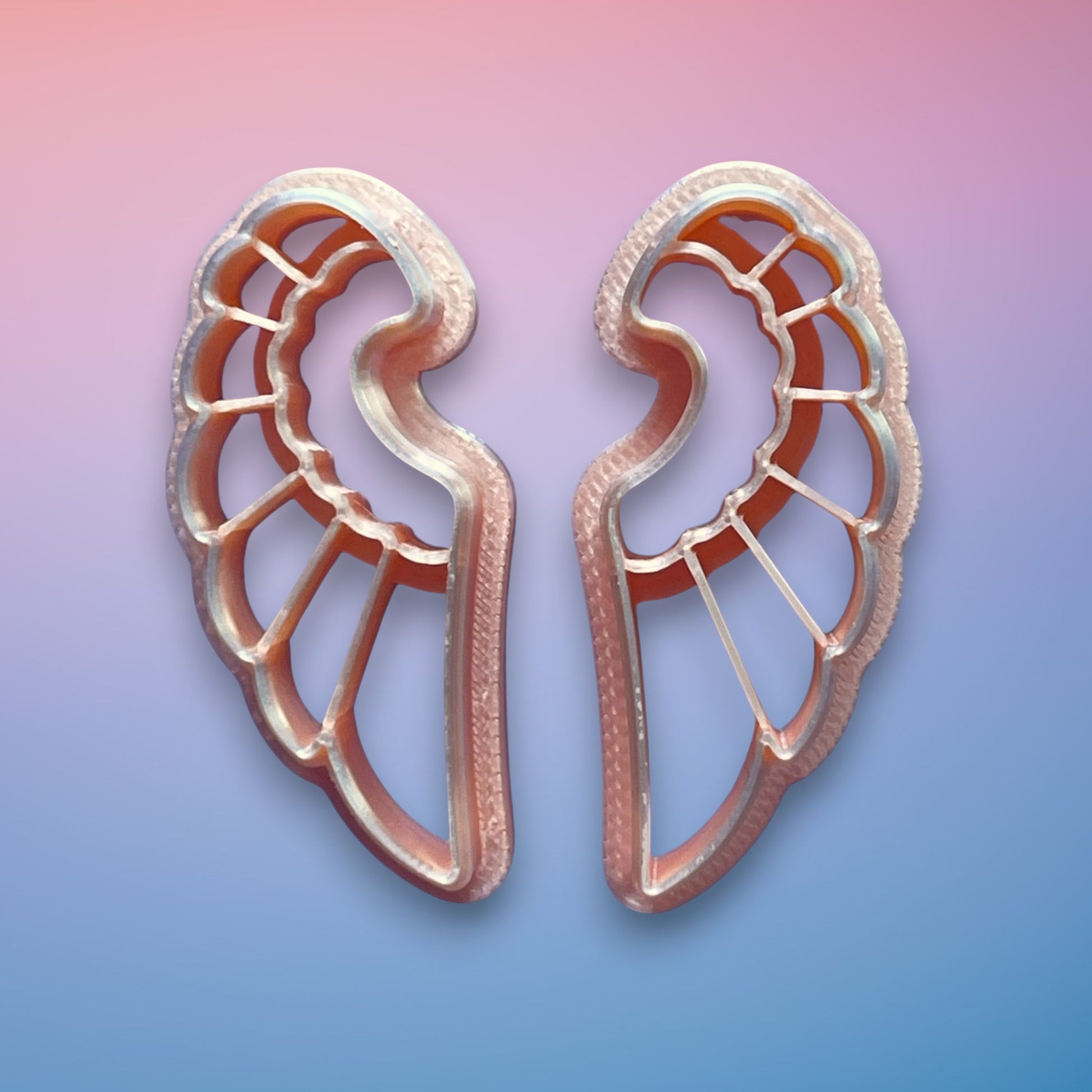 Wing Polymer Clay Cutter
Wings polymer clay cutter with bold symmetrical wing silhouette on white background.