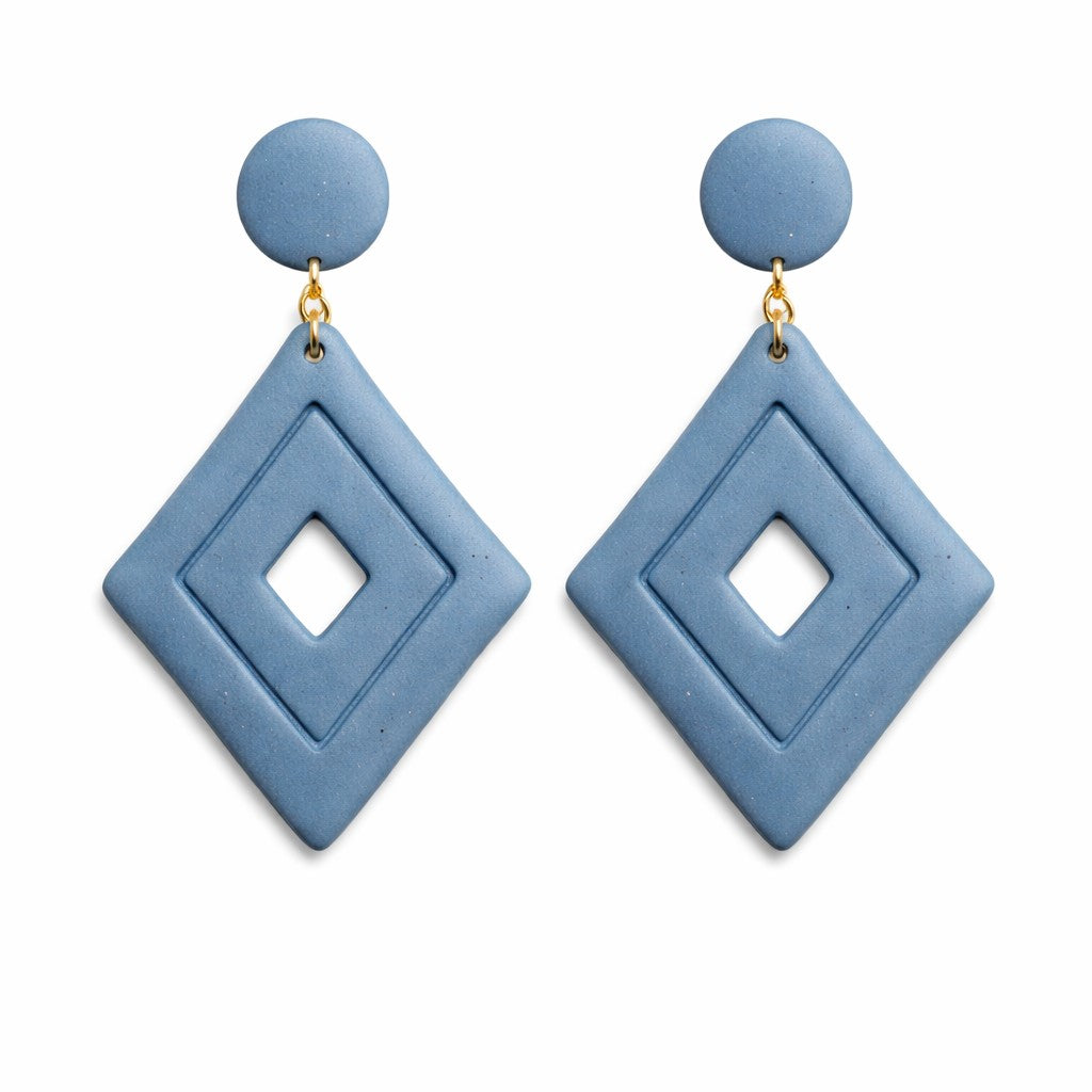 Blue jean diamond-shaped polymer clay drop earrings with a textured denim-inspired finish and geometric silhouette