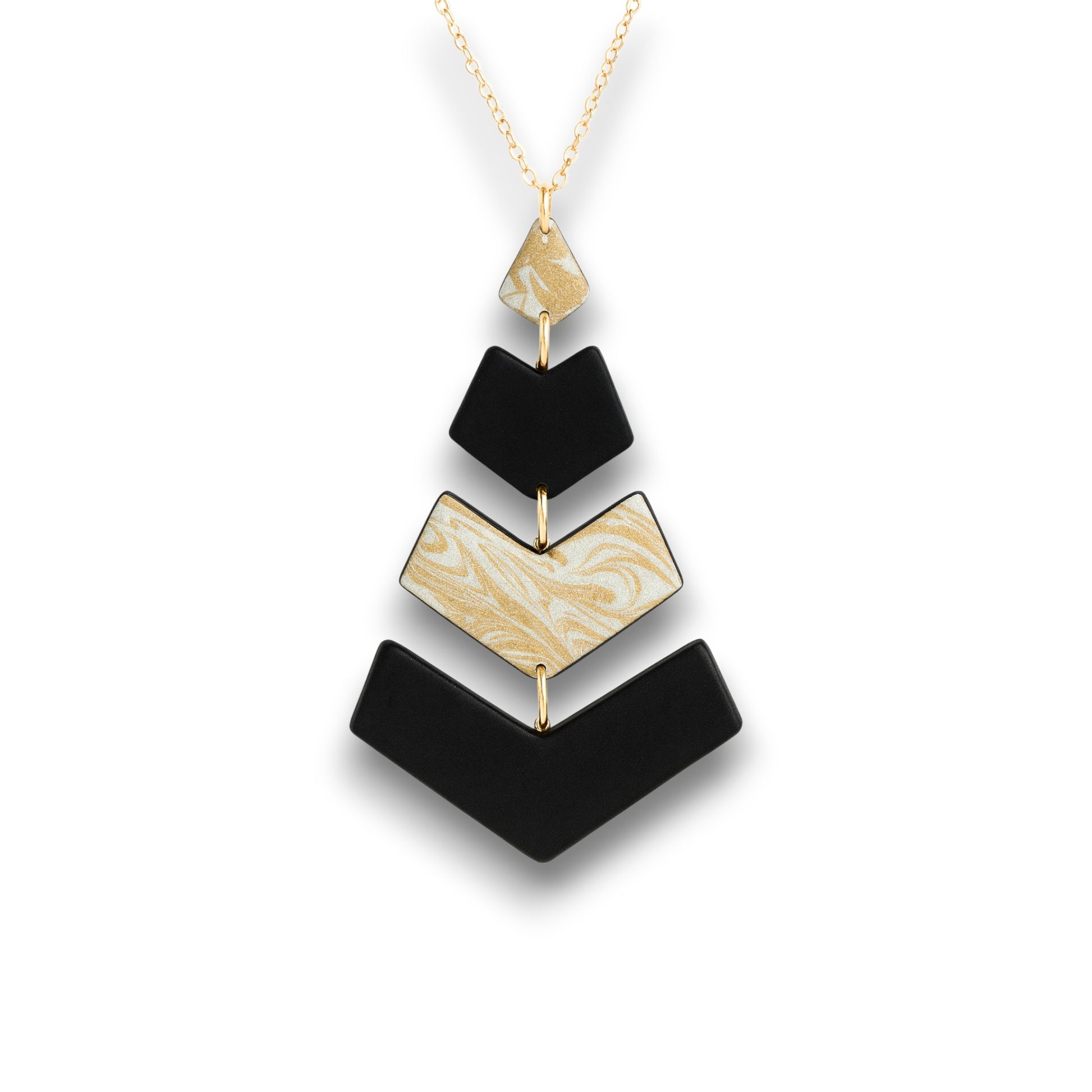 Chevron polymer clay pendant in black and ivory with a gold swirl accent and a modern handcrafted design