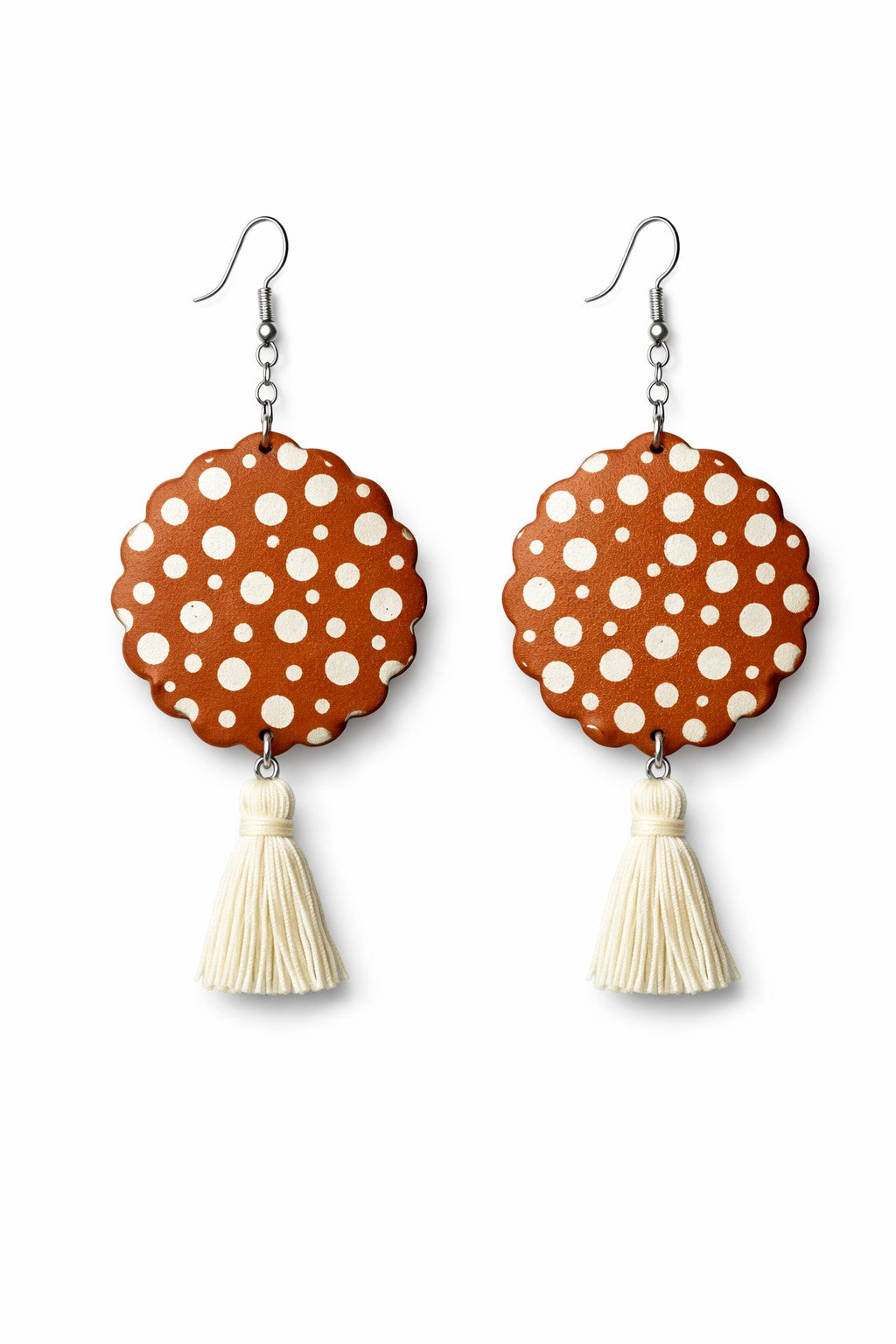 Close-up of frill circle polymer clay earrings showing scalloped edge detail