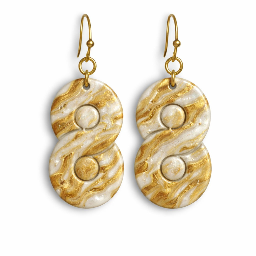 Pearl and gold swirl polymer clay earrings with elegant marbled design