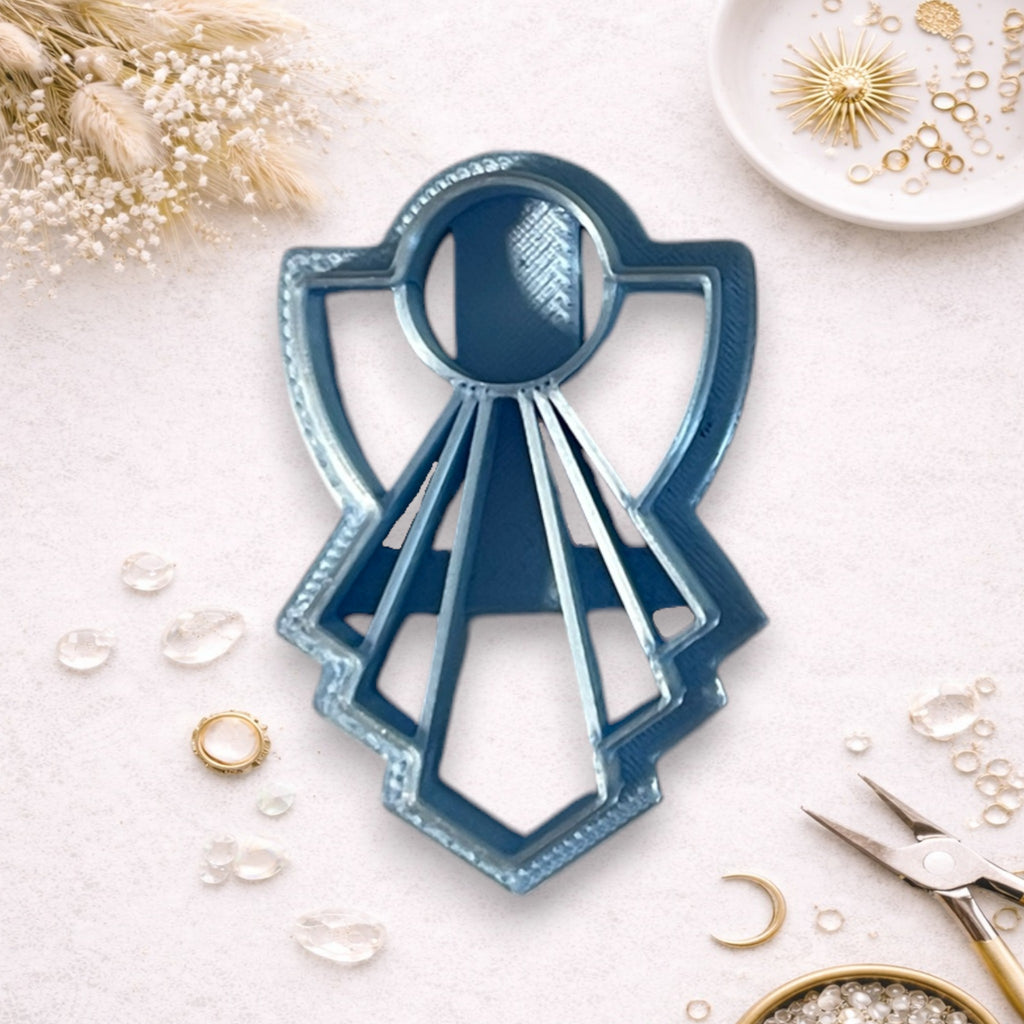 Radiant Plume clay cutter featuring layered sculptural lines for polymer clay earrings and pendants