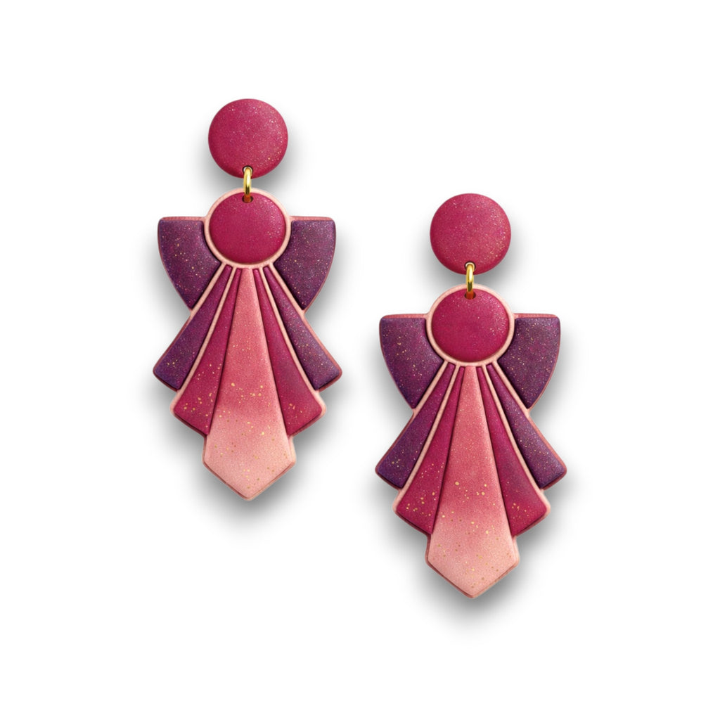 Art deco polymer clay earrings with layered fan shape in magenta, purple, and soft pink tones
