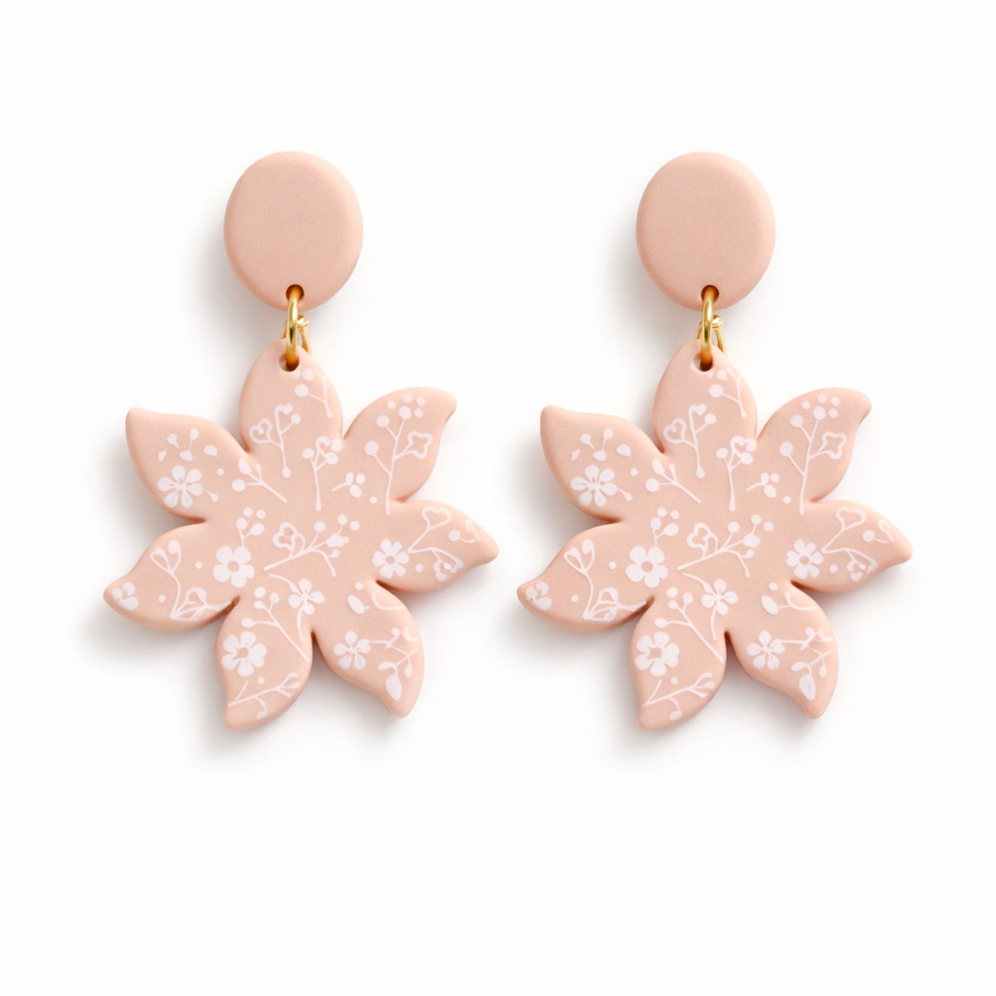 Ripple Flower polymer clay earrings in blush pink with botanical silkscreen pattern