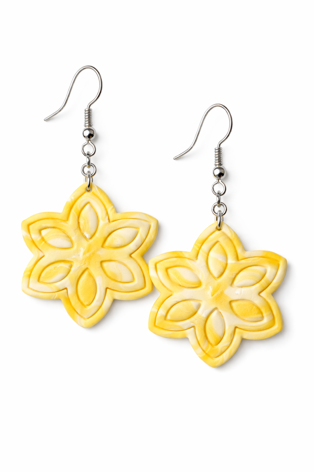 Yellow and white six-petal flower polymer clay earrings featuring embossed petal design